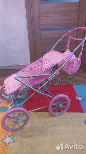 Игрушечная коляска для кукол