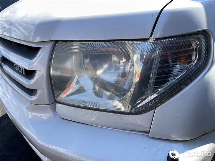 Антенна в бампер передняя левая Mitsubishi Pajero