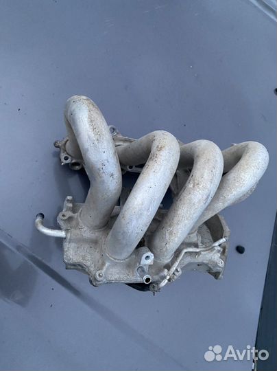 Впускной коллектор Nissan Almera n16