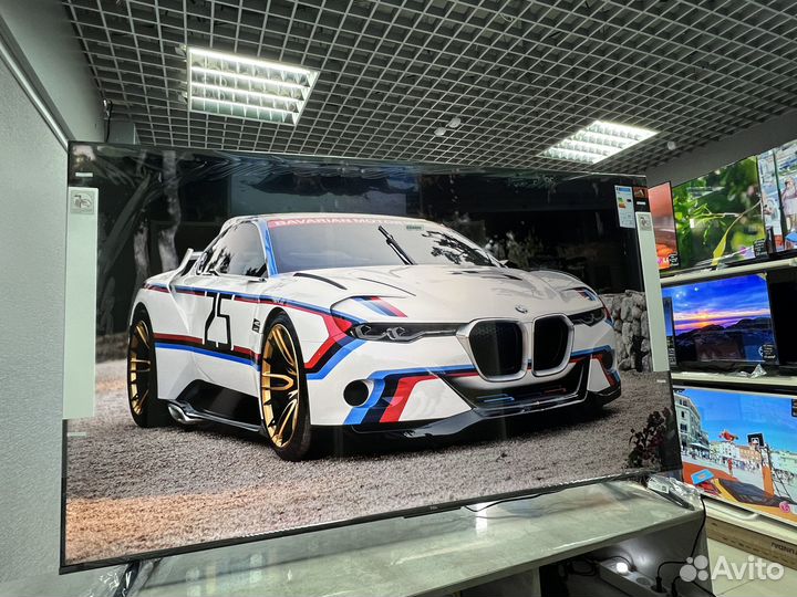 Огромный новый телевизор 65