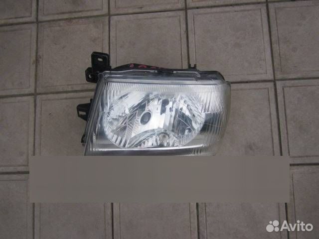 Фара левая MMC Pajero Mini 100-87339