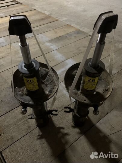 Стойки передние шевроле авео