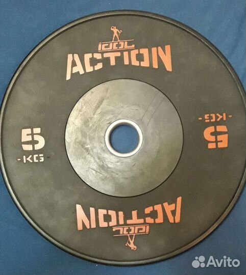 Диск для штанги тренировочный бамперный Rogue