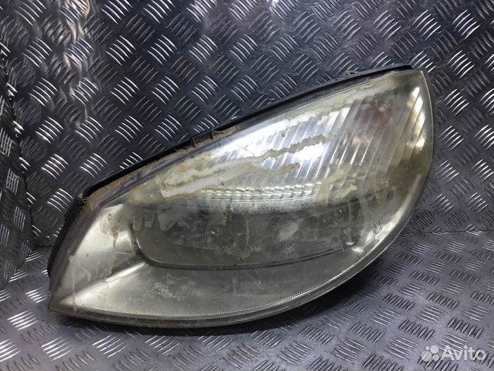 Фара левая Renault Scenic 15810300li F4R770