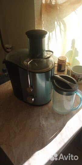 Соковыжималка Moulinex JU-599