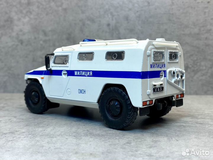 Коллекционная модель газ-233036 тигр омон мвд 1:43