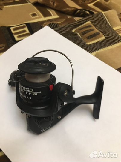 Катушка рыболовная инерционная