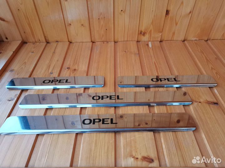 Накладки на пороги opel астра j новые