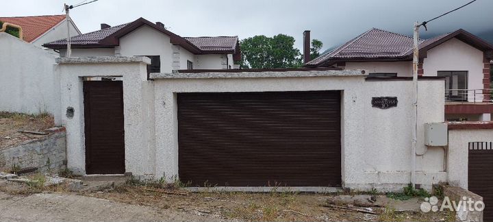 Гаражные секционные ворота бесплатный замер