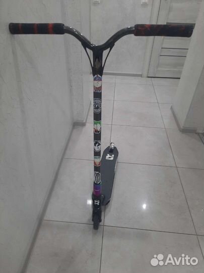 Трюковой самокат б/у с дополнительным рулём