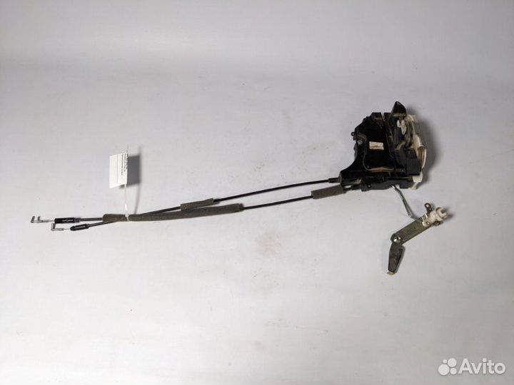 Замок двери передний правый Mitsubishi L200 4 4D56