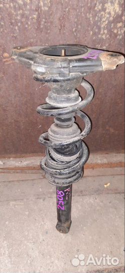 Стойка задняя левая Nissan Primera P12