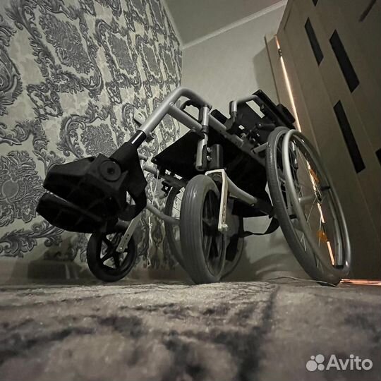 Инвалидная коляска