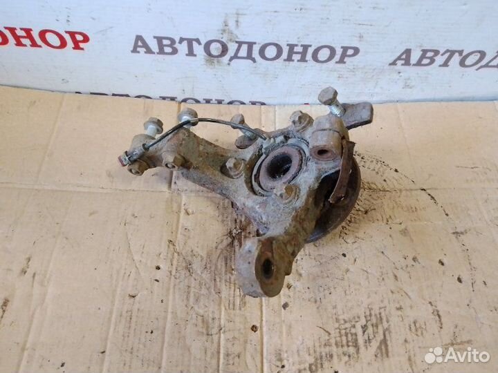 Поворотный кулак передний левый Opel Astra H 1.7D