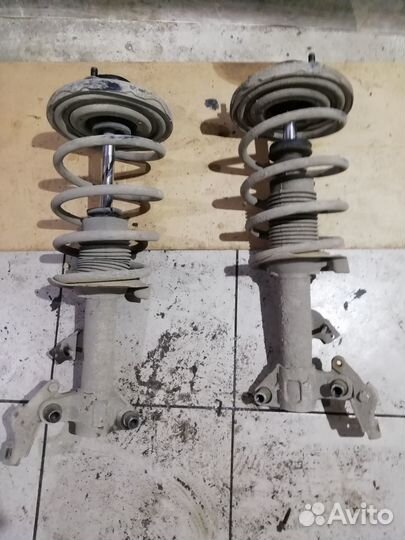 Стойки передние в сборе Nissan Primera P12