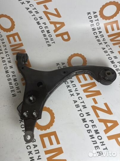 Рычаг передний левый Киа Каренс