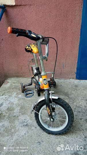 Детский велосипед с приставными колесами