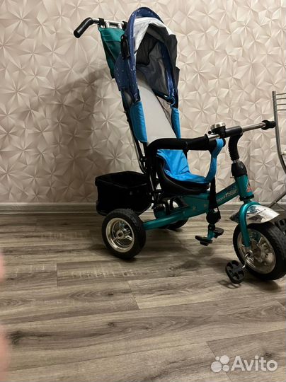 Трехколесный велосипед с ручкой