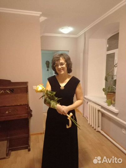 Репетитор по игре на фортепиано