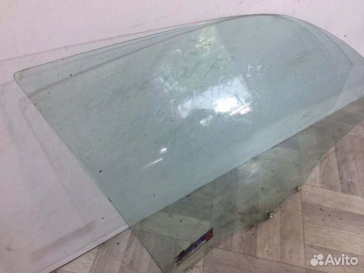 Стекло двери переднее правое Kia Spectra