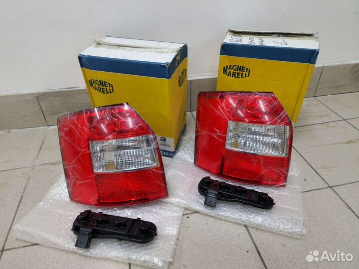 Задний левый фонарь новый Vag Audi A4 B6 Avant