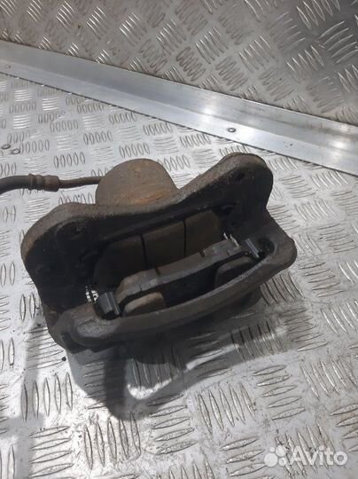 Суппорт передний левый Kia Sportage SL G4KD 2012