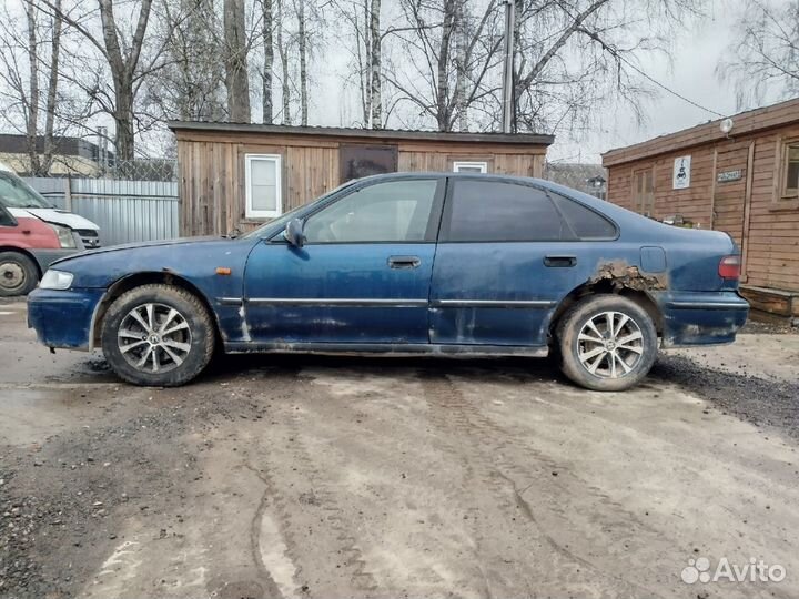 Суппорт передний левый правый Хонда Аккорд 6 1998