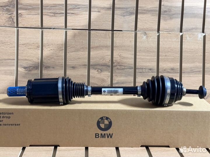 Приводной вал передний L BMW