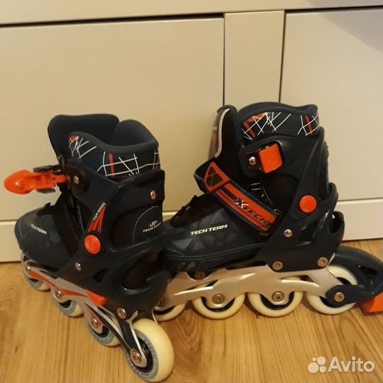 Роликовые коньки