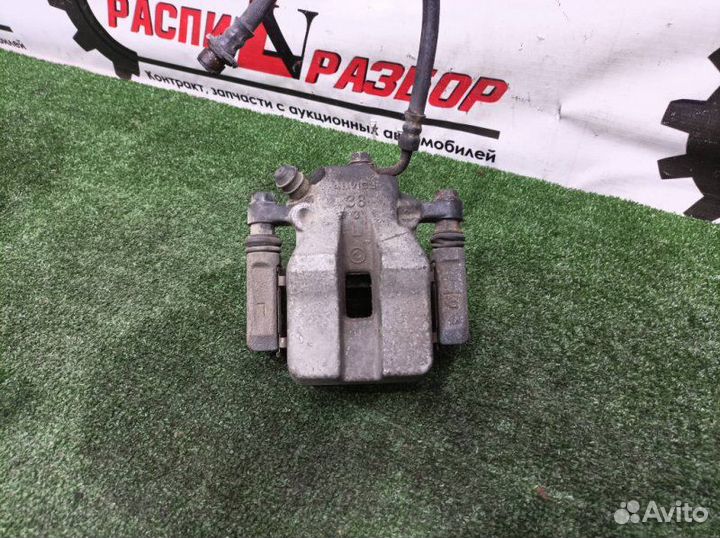 Суппорт тормозной задний левый Toyota Rav4 ACA31W