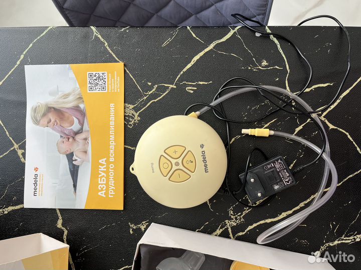 Молокоотсос medela электрический