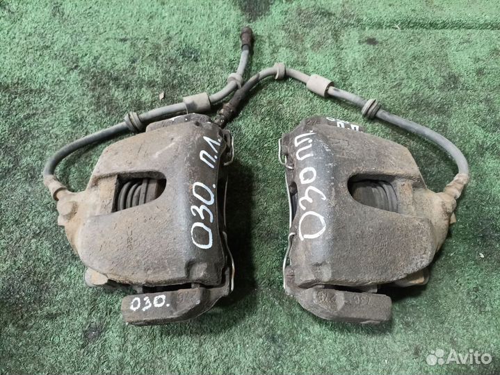 Суппорт тормозной передний левый Ford Focus II (20