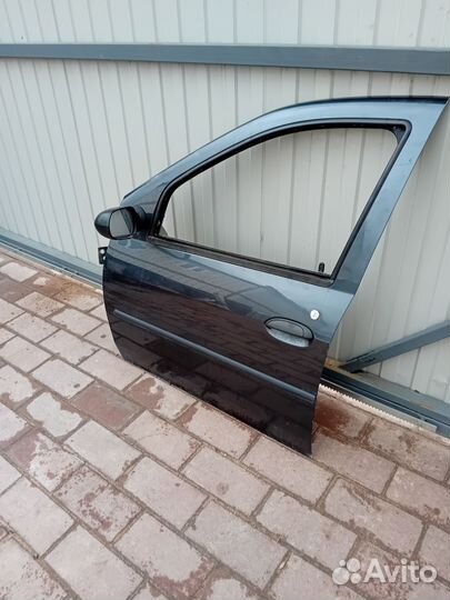 Дверь передняя левая renault logan 1