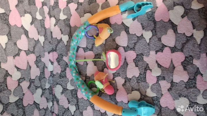 Дуга с игрушками