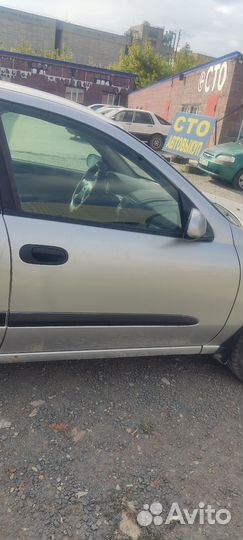 Дверь nissan almera n16