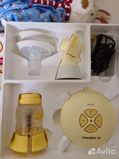 Молокоотсос medela swing flex электрический