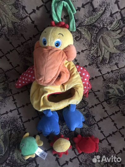 Пеликан на кроватку и мяч с рожками