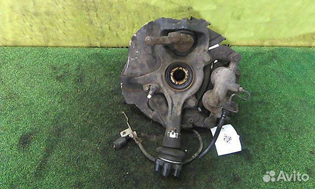 Кулак поворотный левый Mitsubishi Delica