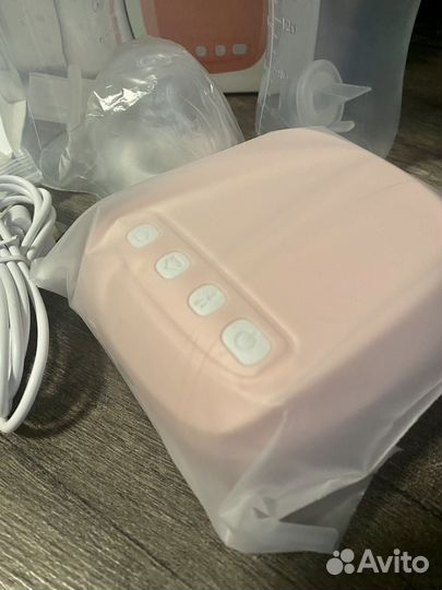 Молокоотсос электрический новый