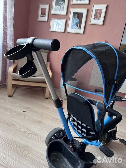 Трехколесный велосипед с ручкой