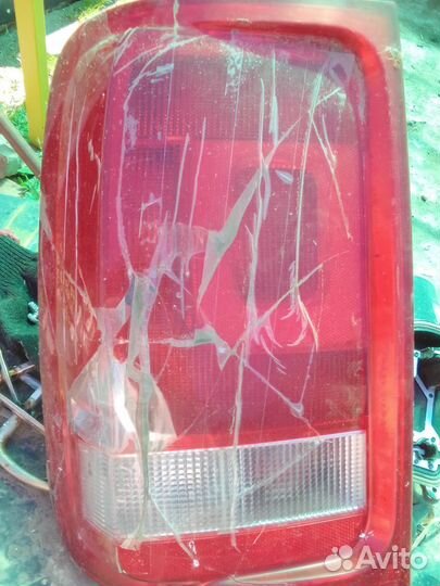 Задний левый фонарь Амарок