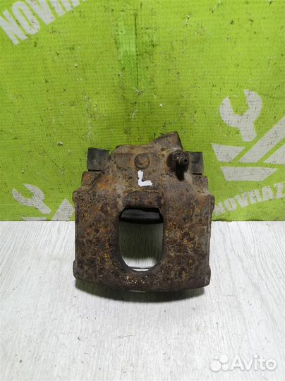 Суппорт передний левый Киа Сепия Шума 96-01