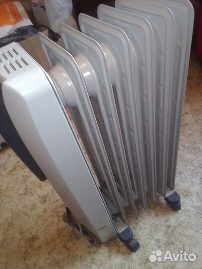 Масляный обогреватель DeLonghi