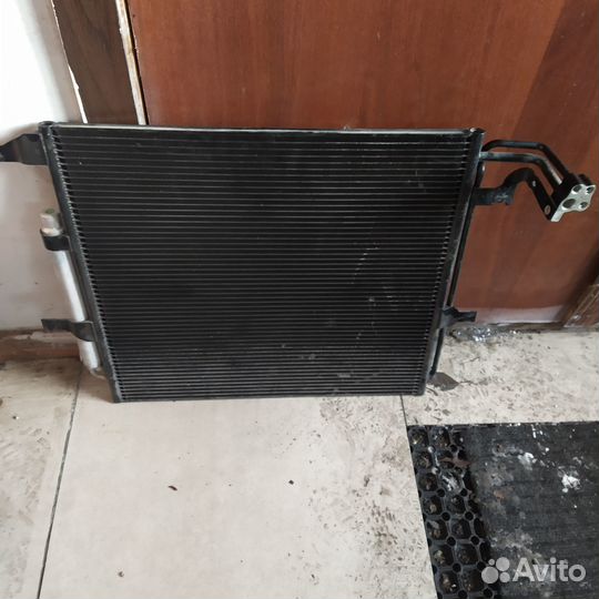 Радиатор кондиционера geely Atlas
