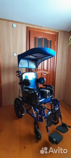 Детская инвалидная коляска