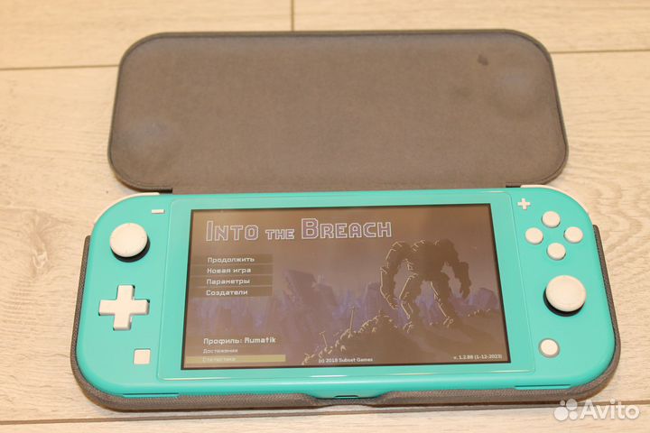Nintendo Switch Lite (+жёсткий чехол)