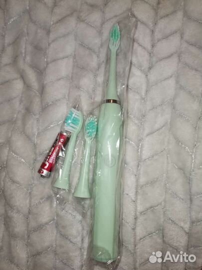 Электронная зубная щетка