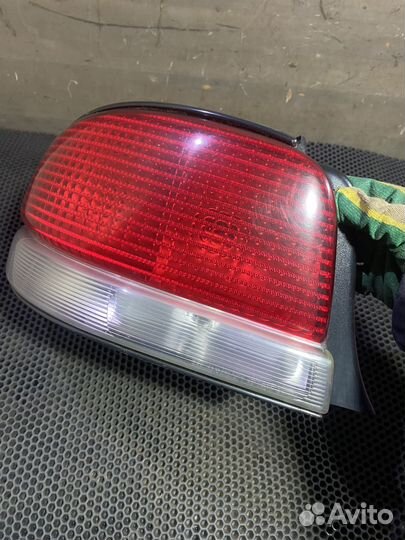 Фонарь задний левый Chrysler Cirrus Stratus
