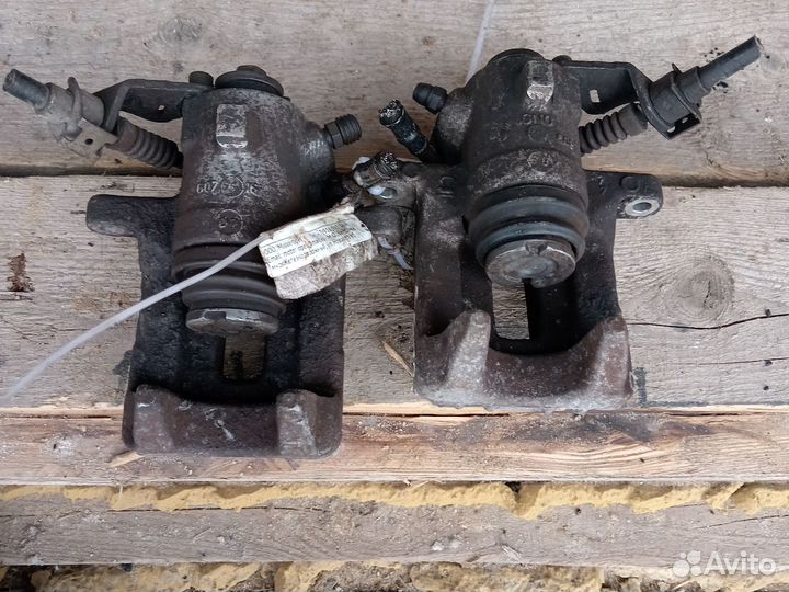 Суппорт тормозной гольф 4 Шкода окт тур