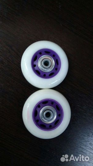 Роликовые коньки